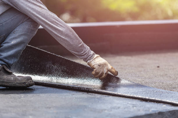 Professional Basement Waterproofing technician working in Huntly, VA